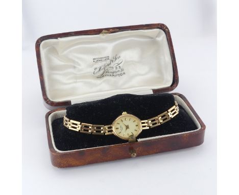 A 9ct yellow gold Rotary lady's quartz Wristwatch, on integral 9ct gold bracelet strap, gross total weight 12.5g, in associat