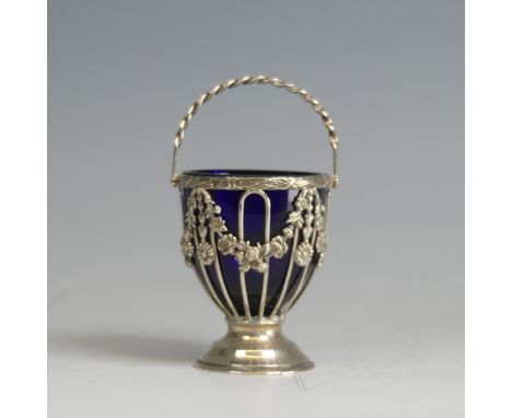 An Edwardian silver Sugar Basket, by&nbsp;Haseler Brothers, hallmarked Chester 1907, of pierced urn form with foliate swag de