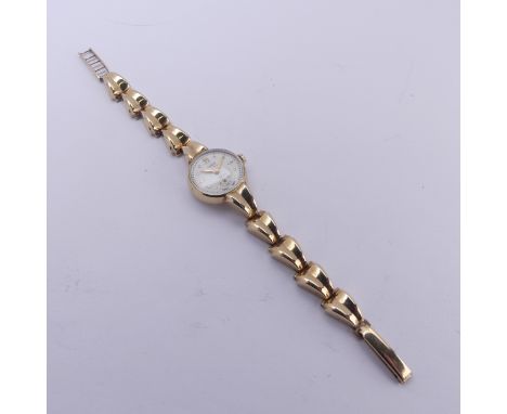 A 9ct yellow gold Tudor Royal lady's Wristwatch, the signed silvered dial with subsidiary seconds, manual wind 17-rubies move