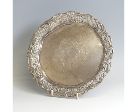 A late Victorian silver Card Tray, by&nbsp;Samuel Walton Smith, hallmarked Birmingham 1895, of shaped circular form with foli