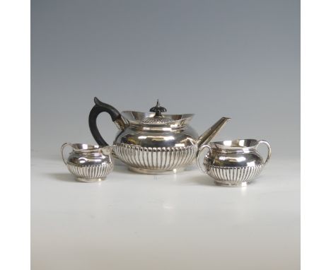 A late Victorian silver Bachelor's three piece Tea Set,&nbsp;by&nbsp;William Hutton &amp; Sons, hallmarked London, 1881/2, of