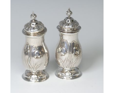 A pair of Edwardian silver Casters,&nbsp;hallmarked for Holland, Aldwinckle &amp; Slater, London 1903, each bearing facsimile