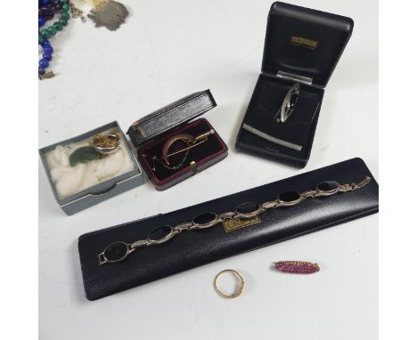 A quantity of Jewellery and Costume Jewellery, including a ruby set brooch, mounted in unmarked yellow metal, tested as 18ct 