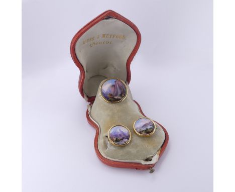 A 19thC Swiss enammelled plaque Brooch,&nbsp;collet set in unmarked gold tested as 18ct, with a corresponding pair of buttons