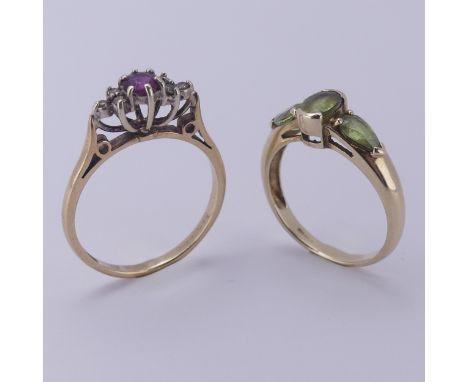 A ruby and diamond cluster Ring, mounted in 9ct yellow and white gold, Size R, together with a three stone green sapphire rin