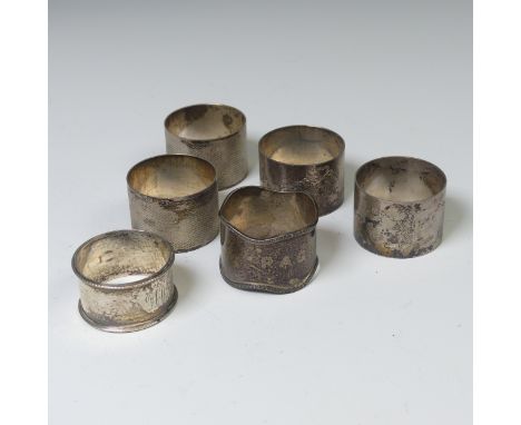A pair of George V silver Napkin Rings, by Joseph Gloster Ltd., hallmarked Birmingham 1915, with ribboned swag decoration, in