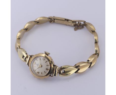 A 9ct yellow gold lady's Ebel Wristwatch, manual wind movement, on 9ct gold bracelet strap, gross total weight 17g,&nbsp;runn
