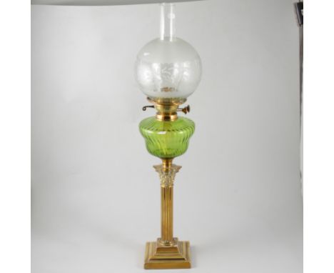 Victorian brass oil lamp, Corinthian column, moulded and tinted reservoir, with chimney and etched shade, 74cm.