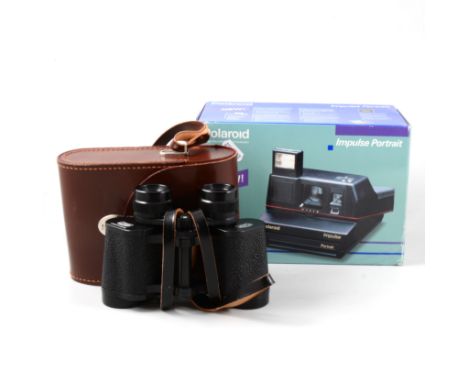 Polaroid camera and binoculars.