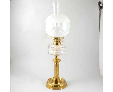 Edwardian brass pedestal oil lamp, clear reservoir, with chimney, and etched shade, 70cm.