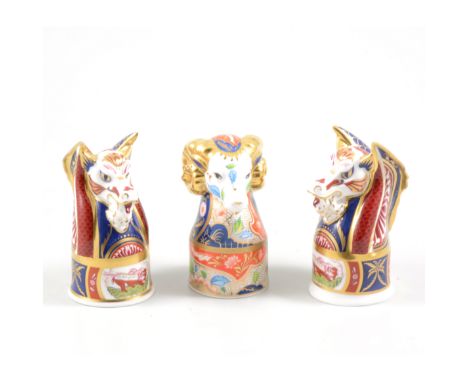 A pair of Royal Worcester Queen Elizabeth II Golden Jubilee limited edition candle snuffers, Lion 10.5cm, and Unicorn 9cm, bo