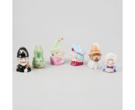 A set of six Royal Worcester Connoisseur Collection candle snuffers, Punch, Judy, Baby, Policeman, Crocodile, and Toby, all l