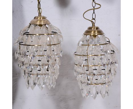 Four Contemporary light fittings, each with five tiers of facet cut drops.