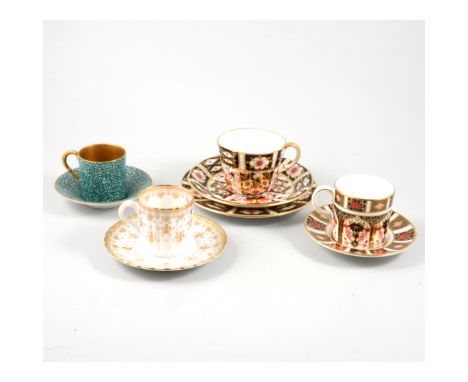 Royal Crown Derby Imari pattern trio, and a collection of other decorative cups and saucers.