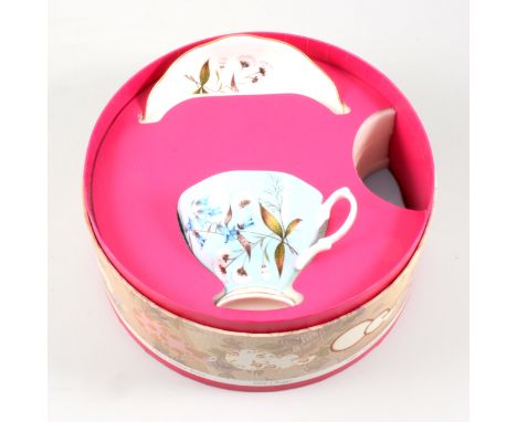 Royal Worcester and Royal Albert cups and saucer boxed sets. (8)