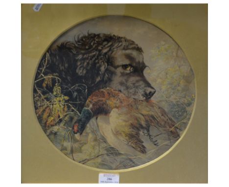 Late Victorian over-painted print, spaniel with a pheasant, tondo, diameter 30cm, gilt slip and frame.