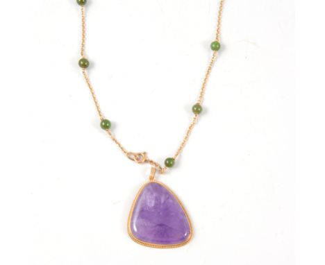 A 9 carat yellow gold pendant set with a 30mm triangular amethyst, fine twisted rope border to frame, hallmarked Birmingham 1