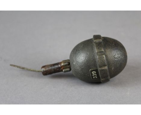 An Inert First World War German "Egg" grenade.