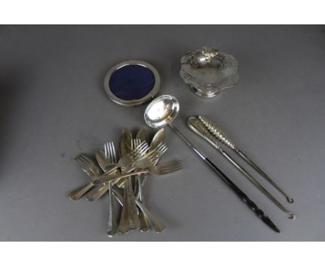 Box including silver photo frame 1905, dish, white metal toddy ladle with baleen handle & others