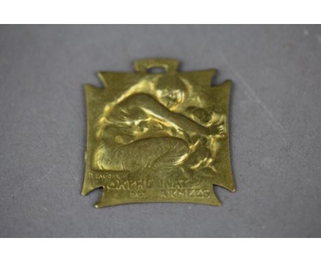 An R. Lalique designed "orphelinat Des Armees" (Orphanage of the War) medallion.
