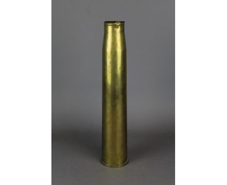A 1943 six Pounder shell case marked to bottom with broad arrow mark.