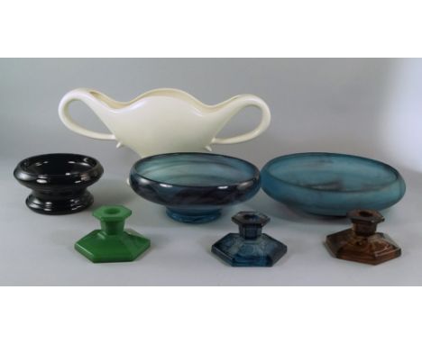 Two English blue glass tazza bowls, on stepped bases, early 20th century, attributed to Davidson, 12 and 12.5cm high, togethe