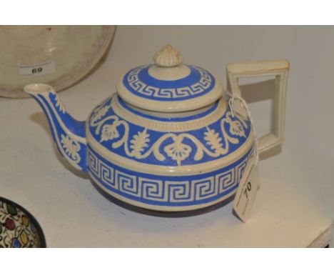 A William Brownfield Cobrdige  relief moulded teapot, c.1850