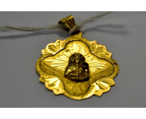 An 18ct gold Madonna and child  pendant, set with a ruby,2.4g 