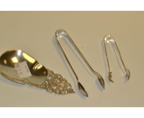 A silver caddy spoon , Mappin and Webb , Sheffield 1905; two silver sugar bows 