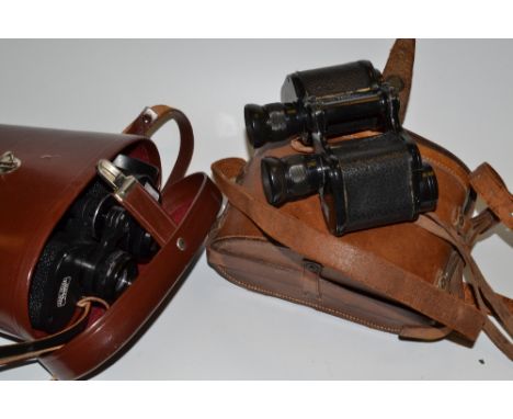 A pair of Army Pattern 3 prismatic binoculars, 8 x 30cm, leather case;  a Carl Zeiss binoculars, 10 x 50