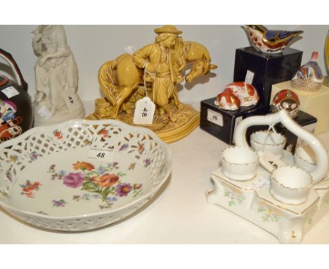 A Continental dish, pierced rim, printed with flowers, early 20th century;  a four place egg stand;  an Eichwald pipe rack, o