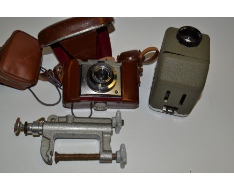 Photographic Equipment - a Zeiss Ikon Contina cased camera , light meter , table clamp and certificate and instruction bookle