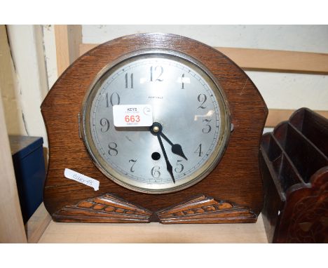 PERIVALE OAK CASED MANTEL CLOCK TOGETHER WITH A BRASS INLAID LETTER RACK