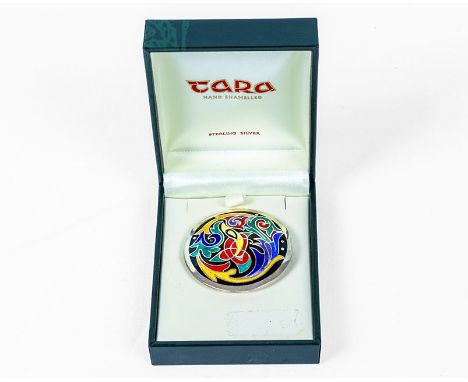 An enamel brooch