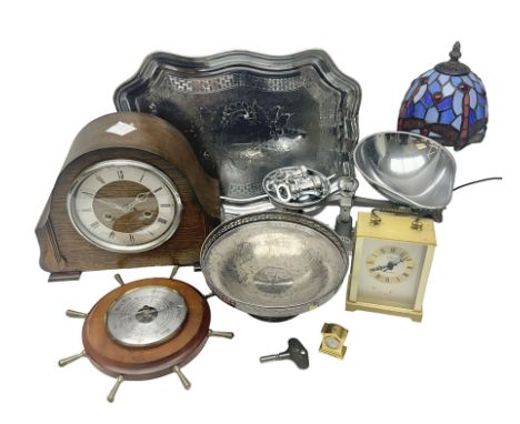 1930s wooden mantle clock, tiffany style table lamp, ships wheel barometer and a collection of other metal ware, etc