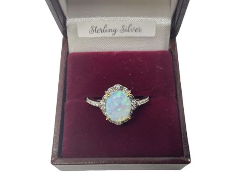 Silver opal and cubic zirconia cluster ring, stamped 925, boxed 