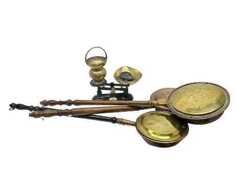 Set of Weylux Prince cast iron and brass weighing scales with weights, together with three copper and brass warming pans and 