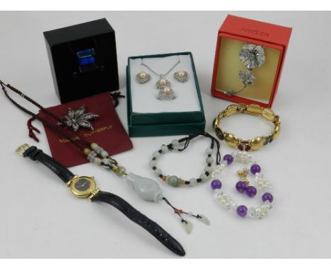 A Cartier watch, having Roman numeral dial and black leather strap, together with various items of jewellery including a Chin