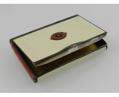 A gilt white metal, white and red enamel snuff box, rectangular and stamped with import mark, W. 8cm.