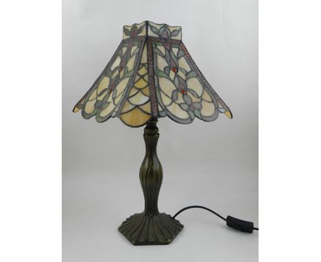 A Tiffany style table lamp, having stained glass shade. H: 46cm 