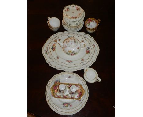 A Royal Worcester part tea and dinner service, decorated with sprays of flowers, gilt edge, to include four coffee cups, teap