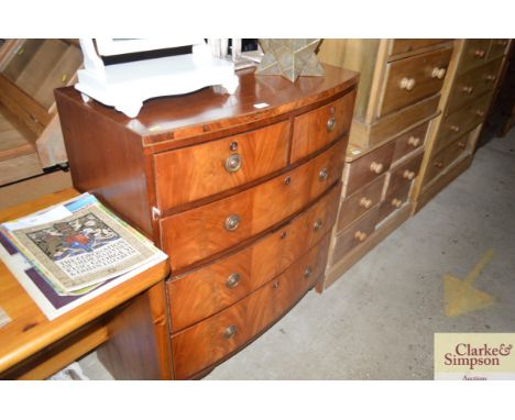 A 19th Century mahogany bow front chest fitted two short over three long drawers