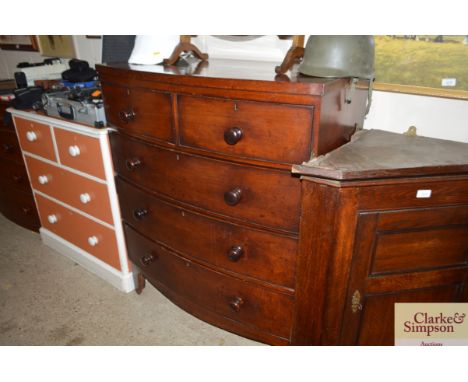 A 19th Century bow front chest fitted two short over three long drawers 