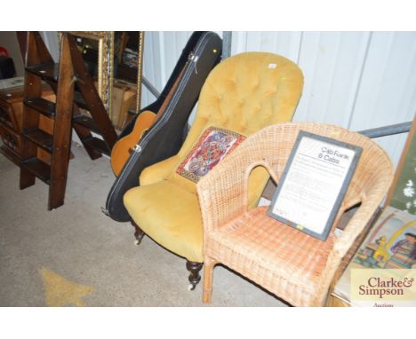 A reupholstered button back 19th Century nursing chair 