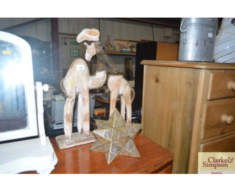 Two nodding headed animals and a star lamp shade