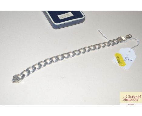 A silver chain link bracelet