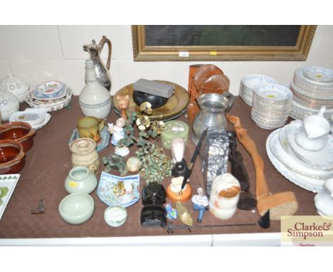 A quantity of decorative items to include ethnic style busts, bookends, jade type trees, Studio pottery items etc.