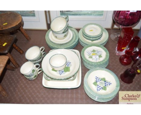 A quantity of Poole pottery tea and dinnerware 