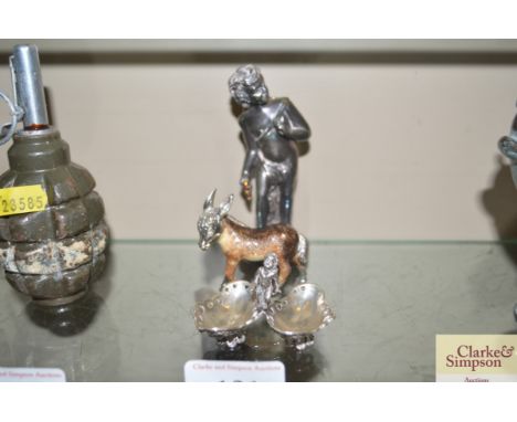 A Saturno silver enamel donkey, stamped 925 and initialled A.R.; and a silver enamel figure signed Otta Diani; and a pair of 