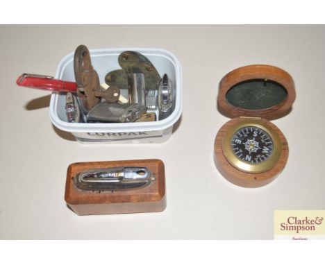 A collection of lighters; a working Union padlock and a rosewood boxed compass  